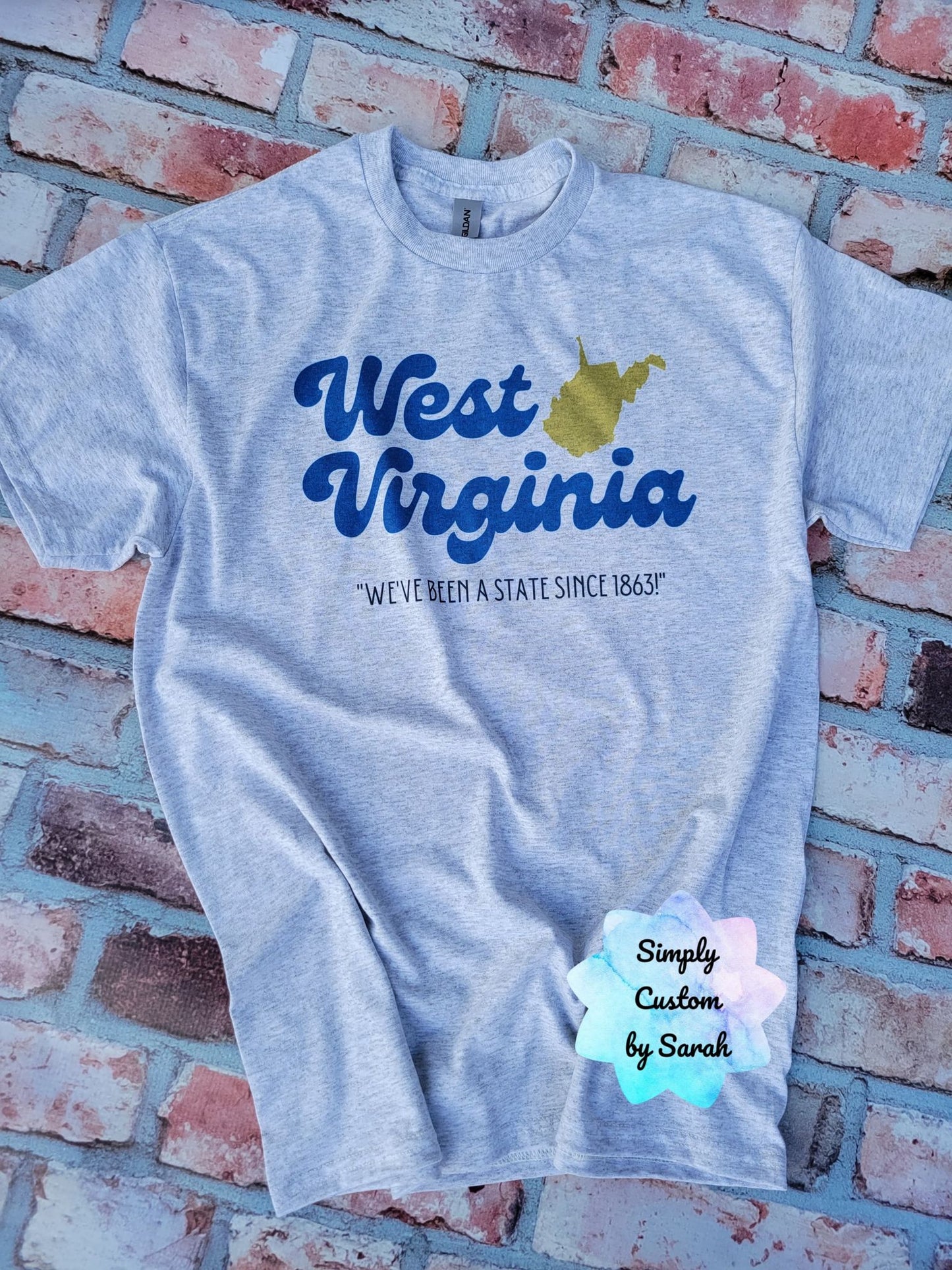 WV Been a State Since 1863 on a Light Grey Tee